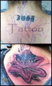 A black smudge tattoo is brilliantly covered up with a colorful flower. 45 Unique Lily Cover Up Tattoos