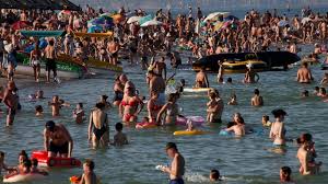 In Russia and Ukraine, no social distance on crowded beaches - ABC ...