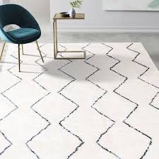 Modern Rug In Living Room With Cute Patterns A White And Black Rug Suites For Any Modern Living Room Int Rugs In Living Room Rugs On Carpet Living Room Carpet