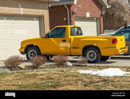Image result for Bright Yellow 1990 Truck