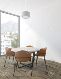 Kitchen & dining room tables. Minimalistic White Dining Room Corner With A Round White Table Stock Photo Picture And Royalty Free Image Image 96117390