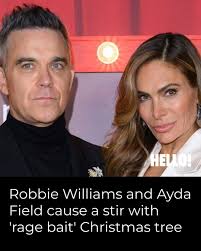 Angels' singer Robbie Williams and his wife Ayda Field caused a stir with  their so-called 'rage bait' Christmas tree at their home with three  children, Teddy, Coco, Charlie, and Beau. Watch the