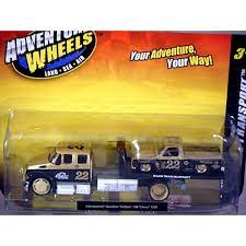 Make social videos in an instant: Maisto Elite Transport Set International Durastar Tow Truck With 1987 Chevrolet Pickup Race Team Support Truck Global Diecast Direct