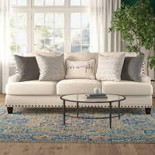 The nailhead trim on the face of the arms and front edges give this modern sofa an edgy, polished look. Farmhouse Rustic Nailheads Sofas Birch Lane