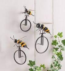 This Whimsical Metal Bee On Unicycle Wall Art We Like To Call It A Beecycle Has Charm To Spare Handcraf Large Outdoor Wall Art Wall Art Outdoor Wall Art