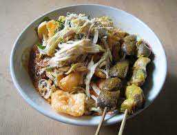 A Bubur Ayam Chicken Rice Congee With Chicken Liver And Gizzard Satay Sold By Travelling Vendor Cart That Fre Traditional Breakfast Traditional Food Recipes