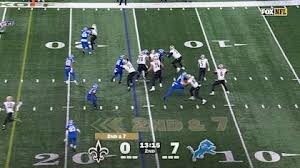 New Orleans Saints quarterback Tyler Shough locates Chris Olave deep midfield for a 22-yard gain