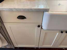 Do not sand too much or you will penetrate lacquer coating and expose mdf below. Painting Our Ikea Oak Kitchen Cabinet Doors White