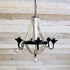 Weathered wood, rust metal, and clear crystal work perfectly and add rich texture and depth to this globe chandelier. Distressed Wood Chandelier
