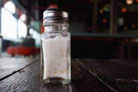 Often, rice is in salt dispensers to prevent moisture from making the salt become clumpy and possibly get stuck in a shaker. Xcqwempss3osfm