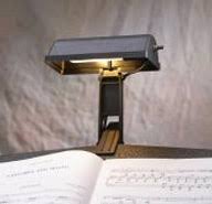 Fordable music stand sheet holder adjustable tripod base metal with carry bag. About Us Kliplite