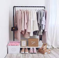 The other nice thing about this clothing rack is that you can use both the front and back bars to hang clothes, so it's got double the storage. Diy Clothes Rack Ideas