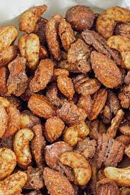 Sweet And Spicy Roasted Nuts Snack Recipe With Walnuts Pecans Almonds Cashews Cumin Cayenne Pepper And Roasted Nuts Recipe Nut Recipes Spiced Nuts Recipe