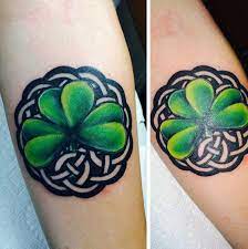 A beautiful irish tribal tattoo design on the spine of this lady. 50 Shamrock Tattoo Designs For Men Ireland Ink Ideas