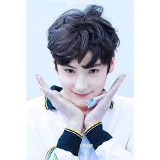 image may contain 1 person closeup txt kai kpop