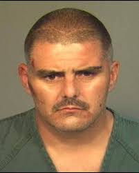 Man arrested in fatal 1993 gang shootout