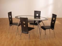 Lambda oval glass dining table is made from a unique sculpted base which effortlessly supports a thick toughened glass table top. Oval Dining Table Set Buy Black Glass Oval Dining Table Set In Uk