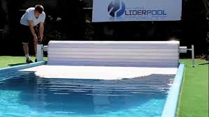 They use a simple pulley principle. Pool Cover Roller Shutter Liderpool Manual With Crank Youtube