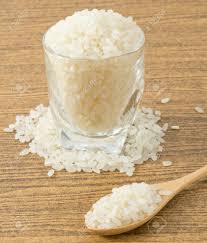 Japanese Cuisine Raw And Uncooked Japanese Rice In A Wooden Spoon And Tumbler Stock Photo Picture And Royalty Free Image Image 88297077