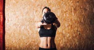 With a russian kb swing, the kettlebell will peak somewhere between your chest and your eyes. Russian Kettlebell Swing Benefits Technique Tips And Muscles Worked Boxrox