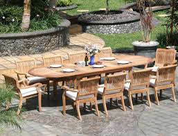 72 round table, 10 lua stacking arm chairs by teak deals. 11 Piece Grade A Teak Dining Set Large Oval Table And Stacking Arm Chairs Review Teak Patio Furniture World
