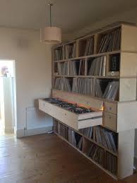 How Cool Is This Custom Record Shelves With Slide Out Turntables Plattenregal Dj Pult Wohnzimmer Platten Aufbewahren