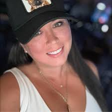 Where can I find a black shoulder bag with gold chain?