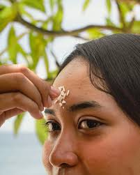 In Balinese culture, bija (sacred rice) is not merely a ritual offering,  but a symbol of purity, protection, and divine connection. After prayer, a  few grains of bija are gently pressed onto