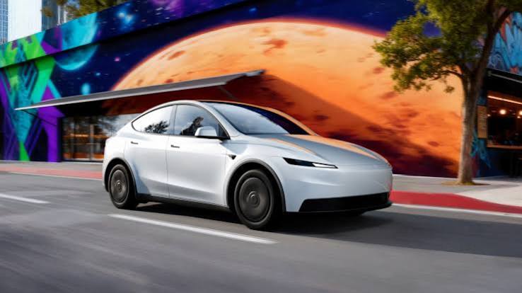 Tesla's cheaper EVs might revive sales but squeeze profit | Reuters