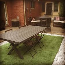 Outdoor Patio With Synlawn Artificial Grass Fire Pit And Dining Table Outdoor Tables Picnic Table Outdoor Patio