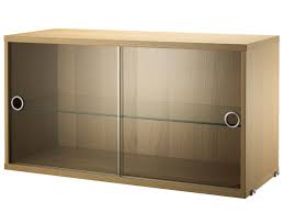 Glass display cabinets keep your valuables in an organized manner. String System Display Cabinet With Sliding Glass Doors Oak Veneer By Kajsa Nisse Strinning 1949 Designer Furniture By Smow Com