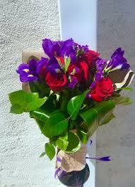 Plus, discover the meaning of different flowers! Iris And Red Rose Bouquet By Orchids Little Secret Boutique