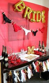 12 Bachelorette Party Ideas 3 A Fun Drink Station With A Red Wall Gold Balloons An Bridal Bachelorette Party Creative Bachelorette Party Bachelorette Party