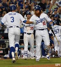 Los Angeles Dodgers Center Fielder Chris Taylor Celebrates With Teammate Justin Turner After Hitting Solo Home Run Against The Chi Dodgers Homerun Dodgers Girl
