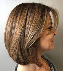 This angled bob shapes the face and flaunts the popular beach wave texture. 80 Best Hairstyles For Women Over 50 To Look Younger In 2021