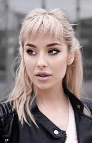 Subtle blonde highlights are woven into the tips, but you can skip them if you'd prefer a more monotone look. 25 Gorgeous Long Hair With Bangs Hairstyles The Trend Spotter