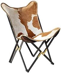 Amazon Com Creative Co Op Cowhide Folding Butterfly Chair With Black Gold Metal Base Each One Will Vary Home Butterfly Chair Cowhide Chair Cowhide Decor