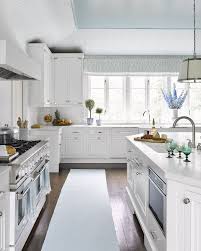 White cabinets in small kitchen do miraculous as focal point with neat, clean and well organized appearance for high ranked sophisticated design in a very significant way. 33 Energizing Kitchen Paint Colors To Brighten Your Home White Modern Kitchen Small White Kitchens All White Kitchen