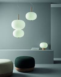 the ilargi collection by groklighting combines the warmth of wood with matte varnish finishes and opal glass to achieve a subtle innenbeleuchtung lampe lampen