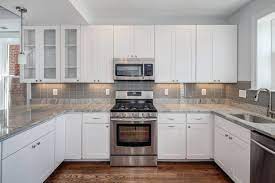 Backsplash your kitchen with glass subway tile. Grey Glass Tile Backsplash Houzz
