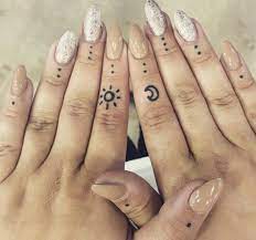 Cute Small Sun And Moon Finger Tattoo Ink Youqueen Girly Tattoos Placement Sun And Moon Finger Tattoo Cute Finger Tattoos Dot Tattoos