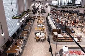ergon house by urban soul project combines deli restaurant and hotel in athens multi storey building athens underwater restaurant