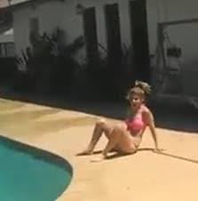 Can you get student discount on pretty little thing. Bikini Girl Jumps Off Roof And Misses Pool Jukin Media Inc