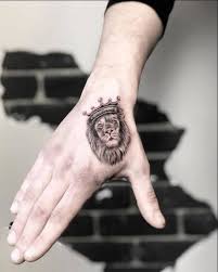The first tattoo we have to show you is stylish and unique. Hand Tattoo Designs For Men Small