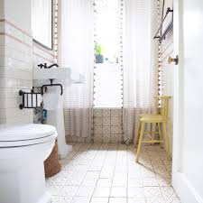 Its effect is even greater in a small bathroom. How To Make Your Bath Look Luxe On A Budget Shower Curtain Trick Apartment Therapy