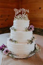 Rustic Wedding All About The Dancing Bustld Planning Your Wedding Just Got Easier Wedding Cake Rustic Wedding Cake Purple Flowers Purple Wedding Cakes