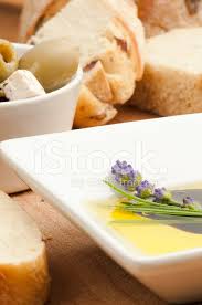 Slice up a loaf of bread (more on this sourdough loaf soon): Lavender Oil And Vinegar With Fresh Bread And Olives Stock Photos Freeimages Com