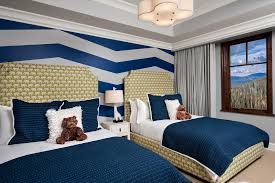 I like using white and blue hues in rooms that have wood floors and furniture. Creative Kids Bedrooms Chairish Blog