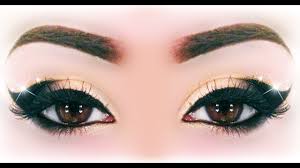 Experiment with color without totally plunging out of your comfort zone by creating the look presented in this makeup tutorial. Sexy Black Gold Makeup Tutorial Inspired By Ely Marino Youtube