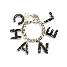 View gallery 17 photos the. Bracelet Gold Black Metal Strass Resin Default View See Standard Sized Version Designer Jewelry Brands Fashion Jewelry Stores Buy Costume Jewelry